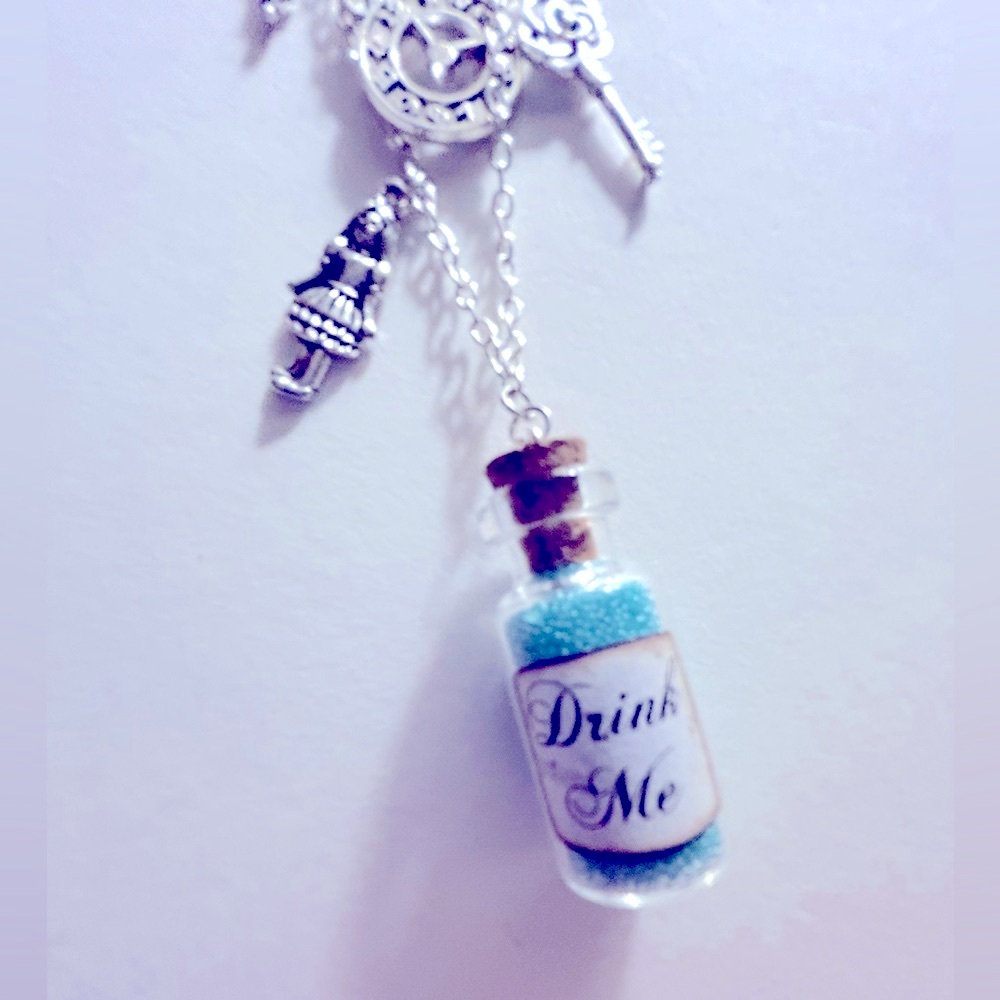 NWOT Necklace Alice in Wonderland “Drink Me” Bottle w mushrooms, Rabbits,  Alice